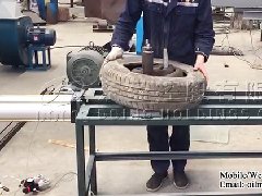 An American customer ordered a Tire Packing Machine from DOING Factory